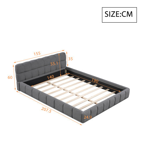 A double bed with a backrest made of soft linen