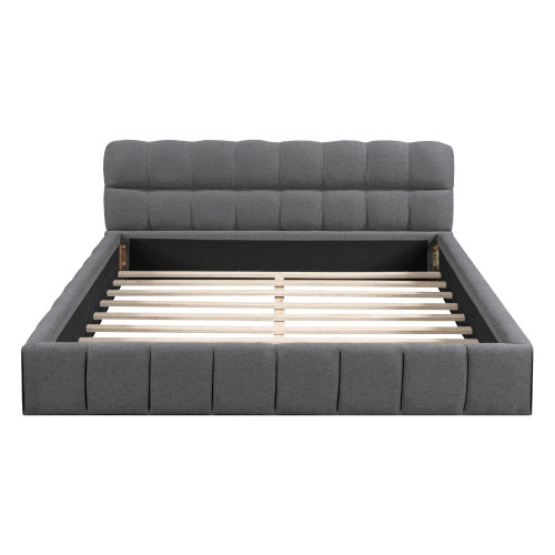 A double bed with a backrest made of soft linen