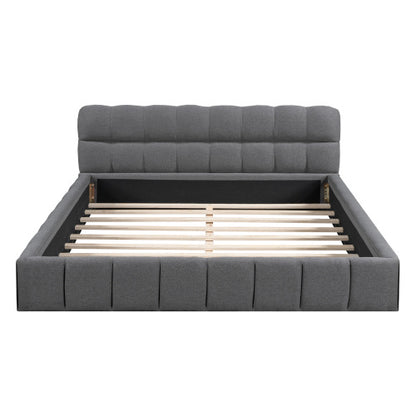 A double bed with a backrest made of soft linen